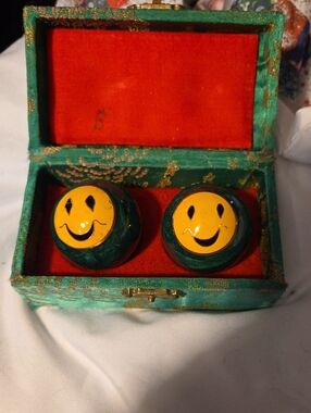 Smiley Face Decorative Spheres in Green Box